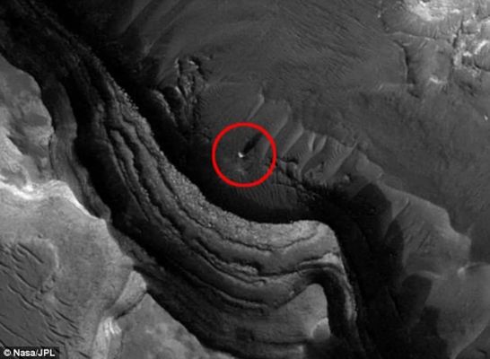 A new "Monolith-like Structure" on Mars...
With thousands of images taken by various probes sent to Mars, it would seem inevitable that unusual or puzzling objects might be seen in some of them. And of course, there have been, most notably the famous “Face on Mars” first seen in low-resolution Viking Orbiter images in the 1970s. Higher-resolution images taken later by other orbiters with better cameras showed it, and nearby interesting formations, to be just natural hills and mesas. Despite that, other curious things are seen in both orbital and ground images from time to time, although they almost always have a simple prosaic explanation. Another such oddity was seen in an image taken by the Mars Reconnaissance Orbiter (MRO), which has attracted some attention. Most likely it is a natural rock formation, but it’s also not, as described by the tabloid Daily Mail, a “spherule” either.

The image shows a bright object casting a long shadow across the Floor of what might be a dried-up lakebed. Some observers have said it might be a Tower (or "Spire"), judging by the long shadow, but the view is from directly above and not enough detail can be seen on the object itself. The object does stand out for its brightness, but little more can be said about it. Using Occam’s Razor, it is most likely a natural geological rock formation, and not an alien tower, but it also can’t be a round “spherule” as referred to. The spherules seen by the Opportunity and Curiosity rovers are tiny, only a few millimeters across, way, way too small to be seen from orbit. If at all sphere-shaped, it is much bigger than that. Simply being round or tall also wouldn’t prove it was something artificial.
Parole chiave: Martian Surface - possible Anomaly