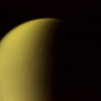 Polar Clouds on Titan (IR View - False Colors; credits: Lunexit)
Caption NASA:"Frigid Titan continues to prove itself a remarkably complex and dynamic world. Here, bright clouds are seen encircling the moon's North Polar Region. 
The Cassini Spacecraft has revealed the presence of great lakes and seas of liquid hydrocarbons on this part of Titan's surface (see PIA08365 and PIA08930). 
An extended, high-altitude haze hovers above the limb of Titan at top of the image. 

The image was taken with the Cassini Spacecraft narrow-angle camera on April 26, 2008 using a spectral filter sensitive to wavelengths of Infrared Light centered at 938 nanometers. The view was acquired at a distance of approx. 786.000 Km (such as about 488.000 miles) from Titan. 
Image scale is roughly 5 Km (a little more than 3 miles) per pixel".
Parole chiave: Saturn's Moon - Titan