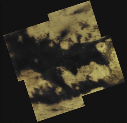 Fensal and Aztlan (CTX Image-Mosaic - Absolute Natural Colors; credits for the additional process. and color.: Dr Paolo C. Fienga/Lunar Explorer Italia/Italian Planetary Foundation)
During its September 7, 2005, Fly-By of the Saturnian moon Titan, the NASA - Cassini Spacecraft acquired a series of images of a Territory located on the moon's Saturn-facing Hemisphere that were afterwards assembled so to create this small mosaic: once known only as "The H" (because this whole Region looks something like the letter "H", when oriented on its side), the Surface Features visible here now possess provisional names that were assigned to them by the International Astronomical Union (or "IAU", for short). 
The Northern Branch of "The H" is now called "Fensal," while the Southern Branch is known as "Aztlan."
Fensal is littered with small "Island-like Landforms" ranging in size from about 5 to 40 Km (such as from approx. 3,1 to a little less than 25 miles) across. These Landforms currently are thought to be Water-Ice Upland Areas (---> kind of small Hills), surrounded by shallower Terrain that is filled-in with dark Particulate Material probably precipitated from the Lower Atmosphere of Titan. In Western Fensal, a few larger Islands can also be seen, like Bazaruto Facula (visible to the right here and containing what seems to be an Impact Crater or, maybe, a Volcanic Edifice). When viewed in images of Shangri-La (another Titanian Region located on the opposite side of Titan as to Fensal and Aztlan), the Island-like Landforms of this size tend to occur in "clusters" (---> groups) with an apparent so-called "Preferred Orientation" (perhaps due to the action of the Dominant Winds blowing over those Territories). The small Islands found in Fensal, instead, appear much more scattered (and most of them appear roughly circular), although a few Islands do have (show) an East-West orientation to their long axis.
Aztlan, on the other hand, appears comparatively devoid of small Island-like Landforms, with only three large Islands located in its Western Reaches, plus only a few smaller Islands. The largest one of these Landforms is called "Sotra Facula" (visible just right of center in the bottom left portion of the mosaic), and measures approx. 240 by 120 Km (such as about 149 to 74,52 miles) across.

The mosaic is centered at 7° North Latitude and 21° West Longitude on Titan and the frames composing it were taken by the NASA - Cassini Spacecraft Narrow-Angle Camera using a filter sensitive to Wavelengths of Near-InfrarRed Light centered at 938 nanometers. They were acquired at distances ranging from approximately 200.600 to 191.800 Km (such as from about 124.572 to 119.108 miles) from Titan. The Mean Resolution in the images forming the mosaic is about 2 Km (such as 1,242 miles) per pixel.

This picture (which is an Original NASA - Cassini Spacecraft b/w image-mosaic published on the NASA - Planetary Photojournal and identified by the n. PIA 07732) has been additionally processed, magnified, contrast enhanced and then colorized, according to an educated guess carried out by Dr Paolo C. Fienga (LXTT-IPF), in Absolute Natural Colors (such as the colors that a human eye would actually perceive if someone were onboard the NASA - Cassini Spacecraft and then looked outside, towards the Saturnian moon Titan), by using an original technique created - and, in time, dramatically improved - by the Lunar Explorer Italia Team. Different colors, as well as different shades of the same color, mean, among others, the existence of different Elements present in the Atmosphere and on the Surface of Titan, each having a different Albedo (---> Reflectivity) and Chemical Composition. 

Note: it is possible (but we, as IPF, have no way to be one-hundred-percent sure of such a circumstance), that the actual luminosity of the Clouds and Hazes (as well as the luminosity of the Surface of Titan itself), as seen in this mosaic, would appear, to an average human eye, way lower than it has been shown (or, better yet: interpreted) here.
Parole chiave: Titan