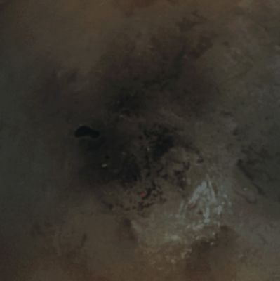 Ontario Lacus and the South Polar Regions of Titan: after the Fog (Absolute Natural Colors; credits for the additional process. and color. Dr Paolo C. Fienga/Lunar Explorer Italia/Italian Planetary Foundation)
This view of Titan’s South Pole reveals the intriguing Dark Feature named Ontario Lacus and a host of smaller features dotting the whole South Polar Region. The true nature of this Surface Feature, seen here at left of center, is not yet known with absolute certainty. However, the Feature’s extremely dark coloration, the shore-like smoothness of its perimeter, and its presence in an area where frequent Convective Storm Clouds have been observed by the NASA - Cassini Spacecraft and Earth-based telescopes, made it the best candidate for an open body of liquid on Titan when this image was taken, in June 2005. This interpretation has, afterwards, been strengthened by the sighting of Surface Features having similar morphologies, but this time in Titan’s North Polar Regions during the Fly-By of this Saturnian moon that occurred in late February of the AD 2007. The possibility that those Northern Features, the sizes of small Seas, are either completely or partially filled with Liquid Hydrocarbons has been significantly strengthened also by the Radar Data collected by Cassini and which overlap portions of the Northern Features seen by the Cassini's Imaging Science Subsystem.
Previously, scientists had speculated that Ontario Lacus might simply be a Broad Depression filled by dark, Solid Hydrocarbons falling from the Atmosphere onto Titan’s Surface. In this case, the smoothed outline might be the result of a process unrelated to Rainfall, such as a so-called "Sinkhole" (---> a cavity in the ground, especially in a limestone formation, caused by water erosion and providing a route for Surface Water to disappear) or a "Volcanic Caldera". However, the strong likelihood that the Dark and Smooth North Polar Features are actually Lakes and Seas has made imaging scientists more confident that Ontario Lacus, and the smaller Dark Features dotting the South Polar Regions of Titan, also hold liquid. If correct, this new revelation would mean that each Pole on Titan is, in fact, a large Wetlands Area. The brightest (and almost white) Features seen here (from about 3 to 6 o'clock of the picture), are Methane Clouds (perhaps mixed with Water-Ice Clouds).
The original frame that we show you today, was taken by the NASA - Cassini Spacecraft during the distant Fly-By of Titan that took place in June 6, of the AD 2005, by using a combination of Spectral Filters sensitive to Wavelengths of Polarized InfraRed Light, allowing Cassini to see through the obscuring smog of Titan's Atmosphere and all the way down to the Surface. The image was acquired from an approximate distance of 450.000 Km (such as about 279.450 miles) from Titan. Resolution in the original image is approximately 3 Km (such as 1,863 miles) per pixel.

This picture (which is an Original NASA - Cassini Spacecraft b/w frame published on the NASA - Planetary Photojournal and identified by the n. PIA 06241) has been additionally processed and then colorized, as if the yellowish Fogs that surrounds the planet had been overcome. The colorization, even in this case, has been made according to an educated guess carried out by Dr Paolo C. Fienga (LXTT-IPF), in Absolute Natural Colors (such as the colors that a human eye would actually perceive if someone were onboard the NASA - Cassini Spacecraft and then looked outside, towards the South Polar Region of the Saturnian moon Titan), by using an original technique created - and, in time, dramatically improved - by the Lunar Explorer Italia Team. Different colors, as well as different shades of the same color, mean, among others, the existence of different Elements present in the Atmosphere and on the Surface of Titan, each having a different Albedo (---> Reflectivity) and Chemical Composition. 

Note: it is possible (but we, as IPF, have no way to be one-hundred-percent sure of such a circumstance), that the actual luminosity of the Albedo Features seen in this frame would appear, to an average human eye, way lower than it has been shown (better yet: interpreted) here.
Parole chiave: Titan
