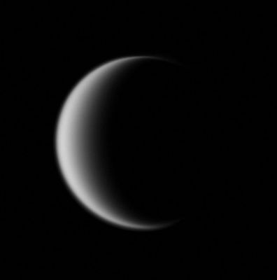 Titan, from 213.000 Km (1 - RAW b/w; credits: NASA)
Caption NASA:"Titan's hazy orange globe hangs before the Cassini spacecraft, partly illuminated - a world with many mysteries yet to be uncovered. 
North on Titan is up and rotated 30° to the right. The moon's North Pole tilts slightly away from the Spacecraft here. 

This view was obtained at a distance of approx. 213.000 Km (such as about 133.000 miles) from Titan and at a Sun-Titan-Spacecraft, or phase, angle of 128°. 
Image scale is roughly 13 Km (about 8 miles) per pixel".
Parole chiave: Saturn's Moons - Titan