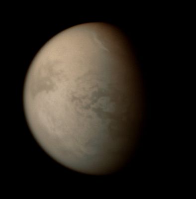 Alien Weather (False Colors; credits: Lunexit)
A bright streak of cloud graces the Northern Skies of Titan. 
This is the second time the Cassini spacecraft's imaging cameras have spotted clouds at 60° North Latitude on Titan - the previous occasion being the Feb. 2007 observations during which the cameras saw the dark, hydrocarbon lakes that cover much of the North.
That cloud feature is visible at the bottom of the still image in Exploring the Wetlands of Titan. The circular, 400-Km wide impact feature Menrva can be seen near center. 

North on Titan is up and rotated 26° to the right. 

The image was taken with the Cassini spacecraft narrow-angle camera on Jan. 20, 2008 using a combination of spectral filters sensitive to wavelengths of polarized infrared light centered at 938 and 746 nanometers. The view was acquired at a distance of approx. 1,3 MKM (800.000 miles) from Titan and at a Sun-Titan-spacecraft, or phase, angle of 58°. Image scale is roughly 8 Km per pixel. Due to scattering of light by Titan's hazy atmosphere, the sizes of surface features that can be resolved are a few times larger than the actual pixel scale".
Parole chiave: Saturn's Moons - Titan
