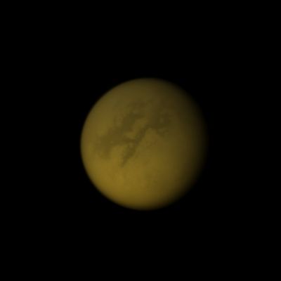 Enchanted Titan (Natural Colors; credits: Lunar Explorer Italia)
Caption NASA:"The Cassini Spacecraft looks toward Fensal and Aztlan, two dark areas near the Equator of Titan. 
Like other albedo features on Titan, these areas are named after enchanted places or paradises from legends and myths from the World's Cultures. Fensal, the name of the area on the left, is a magnificent mansion in Norse mythology. Aztlan, the name of the dark area on the right of the image, is an Aztec mythical land. 
Lit Terrain seen here is mostly on the Leading Hemisphere of Titan. North on Titan is up and rotated 38° to the left. 

The image was taken with the Cassini Spacecraft narrow-angle camera on May 25, 2009 using a spectral filter sensitive to wavelengths of Near-InfraRed light centered at 938 nanometers. 

The view was acquired at a distance of approx. 1,3 MKM (about 808.000 miles) from Titan and at a Sun-Titan-Spacecraft, or Phase, Angle of 25°. 
Image scale is roughly 8 Km (about 5 miles) per pixel".
Parole chiave: Titan