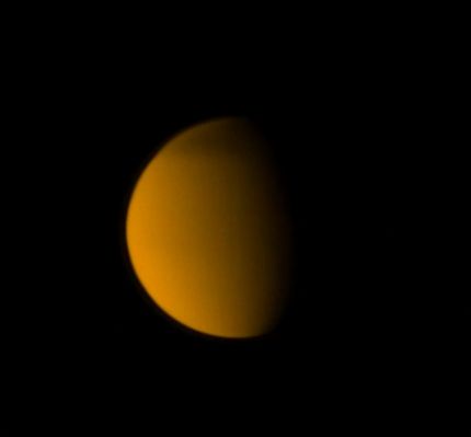 Northern Layers (UV + Natural Colors; credits: Lunexit)
Caption NASA:"This UltraViolet view of Titan shows the moon's North Polar "Hood" (---> cappuccio) and its detached, high-altitude haze layer. See also PIA08137 to learn more. 
This view looks toward the Saturn-facing side of Titan. 
North on Titan is up and rotated 2° to the left. 

The image was taken with the Cassini Spacecraft narrow-angle camera on Aug. 13, 2009 using a spectral filter sensitive to wavelengths of UltraViolet Light centered at 338 nanometers. The view was acquired at a distance of approx. 2,2 MKM (about 1,4 MMs) from Titan and at a Sun-Titan-Spacecraft, or Phase, Angle of 61°. 
Image scale is roughly 26 Km (about 16 miles) per pixel".
Parole chiave: Titan