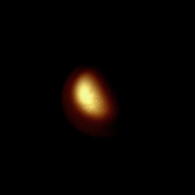 Eclipsed Titan (Natural Colors; credits: Lunexit)
Caption NASA:"Titan becomes obscured as it moves into eclipse by Saturn. Using a camera filter sensitive to Near-InfraRed light, this image manages to show albedo features on the moon. For a view of Titan in eclipse taken in visible light, see PIA11508. 
As it moves into Saturn's shadow, Titan is lit by two sources. Most of the light comes from refracted Sunlight passing through the edge of Saturn's Atmosphere, but Sunlight reflected off the Planet's Rings also reaches the moon. 

This view looks toward the Trailing Hemisphere of Titan. North on Titan is up and rotated 28° to the left. 

The image was taken with the Cassini Spacecraft narrow-angle camera on Sept. 11, 2009 using a spectral filter sensitive to wavelengths of Near-InfraRed light centered at 938 nanometers. The view was acquired at a distance of approx. 2,5 MKM (such as about 1,6 MMs) from Titan and at a Sun-Titan-Spacecraft, or Phase, Angle of 85°. 
Image scale is roughly 15 Km (a little more than 9 miles) per pixel".
Parole chiave: Titan