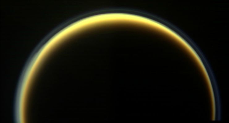 Crescent Titan (Natural Colors; credits: NASA/JPL/Space Science Institute & Lunexit)
Caption NASA:"Titan's golden, smog-like atmosphere and complex layered hazes appear to Cassini as a luminous ring around the planet-sized moon. The world beneath that haze has become slightly less mysterious under the gaze of Cassini and its Huygens probe, but many new discoveries await. 
This mosaic view of Titan represents "Target 3" in the fall 2009 edition of the Cassini Scientist for a Day contest. (See http://saturn.jpl.nasa.gov/education/scientistforaday8thedition/.) The contest is designed to give students a taste of life as a scientist by challenging them to write an essay describing the value of one target choice among three for Cassini to image. 

Images taken using red, blue and green spectral filters were combined to create this color view. Six images -- two sets of three colors -- were combined to create the mosaic. The images were acquired with the Cassini wide-angle camera on Oct. 12, 2009 at a distance of approx. 145.000 Km (such as about 90.000 miles) from Titan".
Parole chiave: Titan