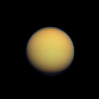 Titan (Natural Colors; credits: NASA/JPL-Caltech/Space Science Institute)
Caption NASA:"Titan's Atmosphere makes Saturn's largest moon look like a 'fuzzy orange ball' in this Natural Color view from the Cassini Spacecraft. Titan's North Polar Hood is visible at the top of the image, and a faint blueish Haze also can be detected above the South Pole at the bottom of this view. Recent Cassini images suggest Titan's North Polar Vortex, or 'Hood', is beginning to flip from North to South (see PIA14913). This view looks toward the Anti-Saturn Side of Titan. North is up.

Images taken using red, green and blue spectral filters were combined to create this Natural Color view. The images were obtained with the Cassini Spacecraft wide-angle camera on Jan. 30, 2012 at a distance of approximately 119.000 miles (about 191.000 Km) from Titan. Image scale is roughly 7 miles (about 11 Km) per pixel".
Parole chiave: Titan