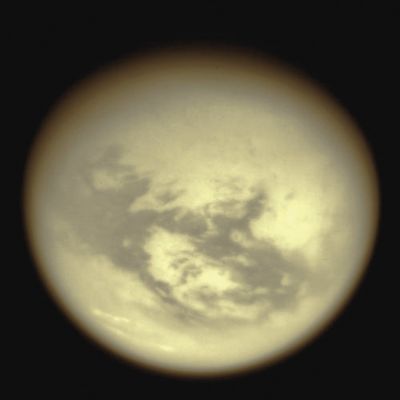 Adiri Region
Caption NASA:"Bright mid-latitude clouds near the bottom of this view hint at the ongoing cycling of Methane on Titan. These cloud streaks are near the same latitude as similar clouds observed above different longitudes on Titan. 
The view is centered on Titan's Trailing Hemisphere, over the 1.700 Km (such as about 1050 mile) wide bright Region known as "Adiri". 
North on Titan is up and rotated 15° to the right. 
This view was created by combining multiple images taken using a combination of spectral filters sensitive to wavelengths of infrared light centered at 939 and 742 nanometers 

The images were taken with the Cassini spacecraft wide-angle camera on May 13, 2007 at a distance of approx. 104.000 Km (about 65.000 miles) from Titan. Image scale is roughly 12 Km (about 8 miles) per pixel. Due to scattering of light by Titan's hazy atmosphere, the sizes of surface features that can be resolved are a few times larger than the actual pixel scale".
Parole chiave: Saturn's Moons - Titan