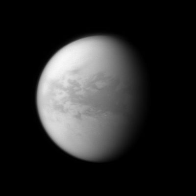 Belet Region
Caption NASA:"The Cassini spacecraft looks at Belet, a Dark Region on Saturn's largest moon, Titan. This large Region on Titan has a low albedo, meaning that it diffusely reflects little light. 
This view looks toward the Trailing Hemisphere of Titan. North on Titan is up and rotated 2° to the right.

The image was taken with the Cassini Spacecraft narrow-angle camera on Jan. 15, 2010 using a spectral filter sensitive to wavelengths of Near-iInfraRed Light centered at 938 nanometers. The view was acquired at a distance of approx. 1,2 MKM (such as about 746.000 miles) from Titan and at a Sun-Titan-Spacecraft, or Phase, Angle of 51°. 
Image scale is roughly 7 Km (about 4,5 miles) per pixel".
Parole chiave: Titan