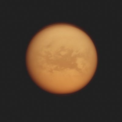 Belet Region (Enhanced Absolute Natural Colors; credits for the additional process. and color.: Dr Paolo C. Fienga - Lunexit Team)
Caption NASA:"The Cassini Spacecraft peers down through the hazy Atmosphere of Titan to view the Dark Region called "Belet". This image was captured using a spectral filter sensitive to wavelengths of Near-InfraRed Light centered at 938 nanometers. The large Region called Belet has a low albedo, meaning it reflects little light. This view looks toward the Trailing Hemisphere of Titan. North is up.

The image was taken with the Cassini Spacecraft narrow-angle camera on June 23, 2011. The view was obtained at a distance of approx. 1,6 MKM (such as about 990.000 miles) from Titan and at a Phase Angle of 14°. Image scale is roughly 9 Km (approx. 5,589 miles) per pixel".
Parole chiave: Titan