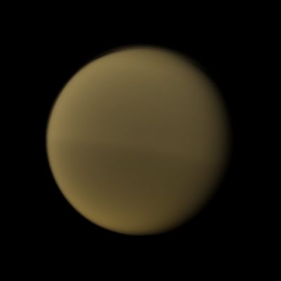 The "Dichotomy Boundary" on Titan (N-IR Light - Natural Colors; credits: Dr Paolo C. Fienga - Lunexit Team)
Caption NASA:"The Cassini Spacecraft records Titan's Seasonal Hemispheric Dichotomy, with the moon's northern half appearing slightly lighter than the southern half in this image.
This view looks toward the Trailing Hemisphere of Titan. North on Titan is up and rotated 12° to the right.

The image was taken with the Cassini Spacecraft narrow-angle camera on Feb. 16, 2010 using a spectral filter sensitive to wavelengths of Near-InfraRed Light centered at 889 nanometers. The view was obtained at a distance of approx. 1,1 MKM (such as about 684.000 miles) from Titan and at a Sun-Titan-Spacecraft, or Phase, Angle of 28°. 
Image scale is roughly 7 Km (about 4,3 miles) per pixel".
Parole chiave: Titan