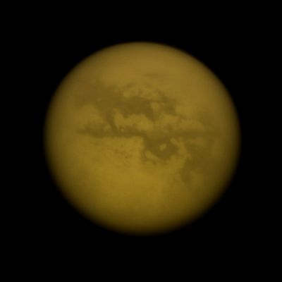 Titanian Geography (Natural Colors; credits: Dr Paolo C. Fienga - Lunexit Team)
Caption NASA:"The Cassini Spacecraft gazes at several albedo features on Saturn's largest moon, Titan. 
Left to right are four Dark Regions: Fensal, Aztlan, Aaru and a part of Senkyo. The bright area Quivira lies near the center of the image, separating Fensal and Aztlan. This view looks toward the Saturn-facing side of Titan. North on Titan is up and rotated 24° to the right. 

The image was taken with the Cassini Spacecraft narrow-angle camera on June 25, 2009 using a spectral filter sensitive to wavelengths of Near-InfraRed Light centered at 938 nanometers. The view was obtained at a distance of approx. 1,3 MKM (about 808.000 miles) from Titan and at a Sun-Titan-Spacecraft, or Phase, Angle of 12°. 
Image scale is roughly 8 Km (about 5 miles) per pixel".
Parole chiave: Titan