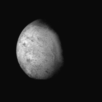 Triton, from 530.000 Km!
Caption NASA:"Voyager 2 was 530.000 Km (330,000 miles) from Neptune's largest satellite, Triton, when this photo was taken, Aug. 24, 1989. With a resolution of 10 Km (about 6 miles), this is the first photo of Triton to reveal surface topography. The South Pole, continuously illuminated by sunlight at this season, is at bottom left. The boundary between the bright Southern Hemisphere and the darker Northern Hemisphere is clearly visible. Both the darker regions to the north and the very bright sub-equatorial band show a complex pattern of irregular topography that somewhat resembles "fretted terrain" on parts of Venus and Mars. 
The pattern of dark and light Regions over most of the Southern Hemisphere will require HR images for interpretation. Also evident are long, straight lines that appear to be surface expressions of internal, tectonic processes. No large impact craters are visible, suggesting that the crust of Triton has been renewed relatively recently that is, within the past billion years or less".
Parole chiave: Neptune's Moons - Triton