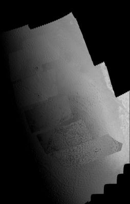 Triton (photo-mosaic - credits: NASA)
Caption NASA:"This picture of Triton is a mosaic of the highest resolution images taken by Voyager 2 on Aug. 25, 1989 from a distance of about 40.000 Km (approx. 24.800 miles). The mosaic is superimposed on the lower resolution mapping images taken about 2 hours earlier in order to fill in gaps between high resolution images. The smallest features that can be seen on the images are about 0,8 Km (approx. 0,5 miles) across. 
The Terminator (such as the line separating the day from the night) is at the top of the picture and is centered at about 30° North Lat. and 330° East Longitude. 
These highest resolution images were targeted for the Terminator Region to show details of the topography by the shadows it casts. Near the center of the picture is a depression filled with smooth plains that are probably ices which were once erupted in a fluid state. The depth of the depression is about 300 meters (900 feet) and the prominent fresh impact crater on its floor is about 20 Km (approx. 12 miles) in diameter and about 1 Km (such as approx. 0,6 mile) deep. On the right is an elongate crater with adjacent dark deposits above it. This feature may be an explosive eruption vent formed by gaps within the ice. 
The linear structure on the left is probably a fracture along which fresh ice has been extruded".
Parole chiave: Neptune's Moon - Triton