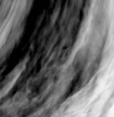 Venusian Turbulence: the Alpha Regio Area
This image of the Venusian South Polar Region was acquired on 24 September 2006 by the Ultraviolet, Visible and Near-Infrared Mapping Spectrometer (VIRTIS) on board ESA’s Venus Express, from a distance of about 53.000 Km from the Planet’s surface. 
The image, taken on the night-side of Venus at a wavelength of 1,7 micron, shows waves structure (faint light vertical streaks at the lower left part of the dark band in the centre-left side of the image) and a highly turbulent region (bottom left). 

The Alpha Regio area is at the bottom left of the image. This area is characterised by a series of troughs, ridges, and faults that are oriented in many directions, with surface features that can be up to 4 Km high. It is not yet clear if atmospheric turbulences may be induced by the rough topography below the clouds. 

The grey-scale of the image is such that black means more transparency, therefore less clouds, while white means more opacity, therefore more cloud concentration.
Parole chiave: Venus - Upper Atmosphere