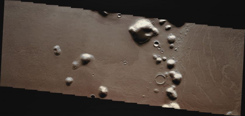 Lava Flows in Marte Vallis (Absolute Natural Colors; credits for the additional processl. and color.: Dr Paolo C. Fienga - Lunar Explorer Italia) 
Caption NASA:"Marte Vallis is a large Volcanic Complex. Platy Flows, where the top crust has cooled and then cracked and moved due to molten lava below, are a typical feature of this Region".

Coord.: 24,0° North Lat. and 186,8° East Long 
Parole chiave: Mars from orbit - Volcanic Features - Lava Flows