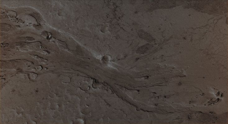 Controversial Features of Zephyria Planum (Absolute Natural Colors; credits for the additional process. and color.: Dr Paolo C. Fienga - Lunexit Team)
Original caption:"This MGS-MOC image shows a portion of a shallow Channel carved in the Plains of the Zephyria Region of Mars. This feature might be the result of the passing of either extremely fluid Lava or, perhaps, Mud".

Location near: 5,1° North Lat. and 203,7° West Long. 
Image width: ~3 Km (~1,9 mi) 
Season: Northern Winter
Parole chiave: Mars from orbit - Volcanic features - Lava/Mud Flows in Zephyria Planum