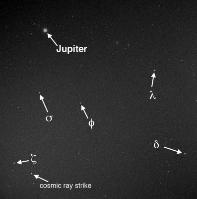In search of the "Vulcanoids"
In mid-February 2009, before and after MESSENGER's latest Perihelion (such as the closest approach to the Sun), an imaging campaign was conducted to search for "Vulcanoids": small rocky bodies that have been postulated to exist in orbits between Mercury and the Sun. Those images are still waiting to be transmitted to Earth. 
The image here is from the first set of 240 MDIS images taken to look for vulcanoids, acquired in June 2008. It is a 10" exposure taken through the WAC's clear filter. Jupiter is bright and visible in the image. The camera field of view is nearly large enough to capture the entire width of Sagittarius, a constellation of the Zodiac visible low and to the South in Summer from temperate latitudes in the Northern Hemisphere. The Greek letters identify some of the brighter stars in Sagittarius. 

During the Vulcanoid search campaign, 4-5 images of the same scene are taken back to back. This procedure allows Cosmic Ray strikes on the camera's detector to be identified and enables fainter objects to be detected. One such Cosmic Ray strike is labeled on this image. In this single image, the Cosmic Ray strike appears similar to the stars, but in the 4 images taken immediately after this one, the Cosmic Ray strike is gone whereas the stars remain. Images are also taken hours and days apart, so the motion of objects in the sky can be determined. If a Vulcanoid were imaged, its motion through the sky would appear very different from motions of the background stars and known Solar System objects. 
No Vulcanoids have been found yet, but the latest set of acquired images will expand the volume of the search region examined so far. 

Date Acquired: June 4, 2008
Image Mission Elapsed Time (MET): 121050477
Instrument: Wide Angle Camera (NAC) of the Mercury Dual Imaging System (MDIS)
WAC Filter: 2 (clear filter)
Field of View: The WAC has a 10,5° field of view
Parole chiave: Space