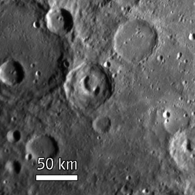 Craterland
MESSENGER's Narrow Angle Camera (NAC) on the Mercury Dual Imaging System (MDIS) acquired this view of Mercuryâ€™s surface illuminated obliquely from the right by the Sun. The unnamed crater (about 52 Km in diameter) in the center of the image displays a telephone-shaped collapse feature on its floor. 
Such a collapse feature, not seen on the floors of other craters in this image, could reflect past volcanic activity at and just below the surface of this particular crater. 

The crater is located in the Southern Hemisphere of Mercury, on the side that was not viewed by Mariner 10 during any of its three flybys (1974-1975). 
This scene was imaged while MESSENGER was departing from Mercury from a distance of 19.300 Km (approx. 12.000 miles), about 1 hour after the spacecraft's closest encounter with Mercury.
The image is of a region approx. 236 Km (about 147 miles) across, and craters as small as 1,6 Km (1 mile) can be seen. 
Parole chiave: Mercury Fly-By