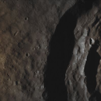 The Walls of Damer (Absolute Natural Colors; credits for the additional process. and color. Dr Paolo C. Fienga/Lunar Explorer Italia/Italian Planetary Foundation)
The (relatively) steep Walls of the Impact Crater named Damer are well highlighted in today's APOD. Named after the English sculptor, Anne Seymour Damer (née Conway, she was born in Sevenoaks - UK - on November, 8, 1749 and died in London on May, 28, 1828) earlier this year by the International Astronomical Union (or "IAU", for short), this approx. 60-Km diameter (such as about 37,26 miles) Impact Crater is distinguished by a massive and complex Central Peak that is almost completely covered with Hollows. 

Date acquired: November, 13th, 2013
Images Mission Elapsed Time (MET): 26687033
Images ID: 5191249
Instrument: Narrow Angle Camera (NAC) of the Mercury Dual Imaging System (MDIS)
Center Latitude: 36,25° North
Center Longitude: 243,40° East
Solar Incidence Angle: 68,3° (meaning that the Sun, at the time that the picture was taken, was about 21,7° above the imaged Local Mercurian Horizon)
Emission Angle: 3,0°
Sun-Mercury-Messenger (or "Phase") Angle: 65,3°

This frame (which is an Original NASA - MESSENGER Spacecraft's b/w and NON Map-Projected image-mosaic published on the NASA - Planetary Photojournal with the ID n. PIA 17812) has been additionally processed, contrast enhanced, magnified to aid the visibility of the details, Gamma corrected and then colorized in Absolute Natural Colors (such as the colors that a human eye would actually perceive if someone were onboard the NASA - MESSENGER Spacecraft and then looked down, towards the Western Edge of the Mercurian Impact Crater "Damer"), by using an original technique created - and, in time, dramatically improved - by the Lunar Explorer Italia Team. Different colors, as well as different shades of the same color, mean, among other things, the existence of different Elements (Minerals) present on the Surface of Mercury, each having a different Albedo (---> Reflectivity) and Chemical Composition.
Parole chiave: Mercury from orbit - Craters - Damer Crater