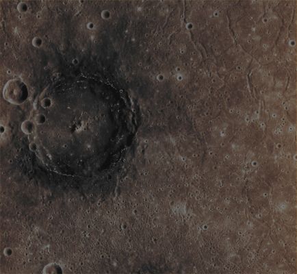 Poe Crater (Absolute Natural Colors; credits for the additional process. and color.: Dr Paolo C. Fienga/Lunar Explorer Italia/Italian Planetary Foundation)
This picture is an image-mosaic made of 3 (three) frames taken by the NASA - MESSENGER Spacecraft in July 2011; it shows the huge and magnificent Mercurian Crater Poe (so named after the American writer, and whose diameter is approx. 77 Km - or about 48 miles), with its almost black colored Rim standing out from the reddish Volcanic Plains that surround it. Even in this case, a number of relatively small Hollows speckles the dark Rim of Poe Crater like stars, in the blackness of night. 

Date acquired: July, 3rd, 2011
Images Mission Elapsed Time (MET): 218204194, 218204190, 218204186 
Images ID: 458399, 458398, 458397
Instrument: Narrow Angle Camera (NAC) of the Mercury Dual Imaging System (MDIS)
Center Latitude: 42,83° North
Center Longitude: 158,9° East
Resolution: 213 meters/pixel
Solar Incidence Angle: 42,8° (meaning that the Sun, at the time that the pictures were taken, was about 47,2° above the imaged Local Mercurian Horizon)
Emission Angle: 35,9°
Sun-Mercury-Messenger (or "Phase") Angle: 78,7°

This picture (which is an Original NASA - MESSENGER Spacecraft b/w image mosaic published on the NASA - Planetary Photojournal with the ID n. PIA 16770) has been additionally processed and then colorized in Absolute Natural Colors (such as the colors that a human eye would actually perceive if someone were onboard the NASA - MESSENGER Spacecraft and then looked down, towards the Surface of Mercury), by using an original technique created - and, in time, dramatically improved - by the Lunar Explorer Italia Team. Different colors, as well as different shades of the same color, mean, among other things, the existence of different Elements (Minerals) present on the Surface of Mercury, each having a different Albedo (---> Reflectivity) and Chemical Composition.
Parole chiave: Mercury from orbit - Craters - E. A. Poe Crater
