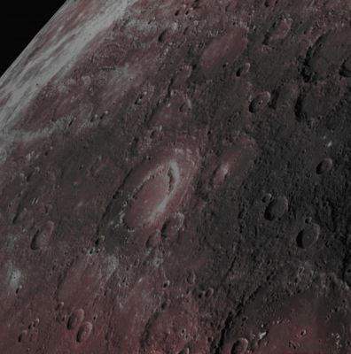 Scarlatti Crater (Absolute Natural Colors; credits for the additional process. and color.: Dr Paolo C. Fienga/Lunar Explorer Italia/Italian Planetary Foundation)
In this image-mosaic, obtained by putting together three frames taken by the NASA - MESSENGER Spacecraft on March, 30, 2014, we can see, located almost at the center of the frame, the large (such as approx. 132 Km - such as about 81,97 miles - in diameter) Peak-Ring Basin known as Scarlatti. 

While Scarlatti has a typical Peak-Ring in many respects, if you take a good look towards its North/Eastern Section (upper right side - Dx - of the Feature), you will be able to notice its "transition" to a relatively wide (in this case, approx. 30 Km - such as about 18,63 miles - across) sort of Collapse Pit, surrounded by High-Reflectance (white and reddish in color) Surface Material. This Pit (perhaps a Volcanic Vent or a Caldera, eons ago), according to several NASA Planetary Scientists, could have been - and we say, as IPF, reasonably, considering all the visible Features characterizing it - the site of some (most likely extremely ancient as well as really powerful) Explosive Volcanic Activity.

Date acquired: March, 30th, 2014
Images Mission Elapsed Time (MET): 38528557, 38528553, 38528551
Images ID: 6032934, 6032932, 6032931
Instrument: Wide Angle Camera (WAC) of the Mercury Dual Imaging System (MDIS)
Center Latitude: 40,70° North
Center Longitude: 258,90° East
Solar Incidence Angle: 86,2° (meaning that the Sun, at the time that the picture was taken, was about 3,8° above the imaged Local Mercurian Horizon)
Emission Angle: 51,1°
Sun-Mercury-Messenger (or "Phase") Angle: 137,3°

This picture (which is an Original NASA - MESSENGER Spacecraft's false colors and NON-Map-Projected image-mosaic published on the NASA - Planetary Photojournal with the ID n. PIA 18215) has been additionally processed, contrast enhanced, Gamma corrected, magnified to aid the visibility of the details and then re-colorized in Absolute Natural Colors (such as the colors that a human eye would actually perceive if someone were onboard the NASA - MESSENGER Spacecraft and then looked outside, towards the Surface of Mercury), by using an original technique created - and, in time, dramatically improved - by the Lunar Explorer Italia Team. Different colors, as well as different shades of the same color, mean, among other things, the existence of different Elements (Minerals) present on the Surface of Mercury, each having a different Albedo (---> Reflectivity) and Chemical Composition.
Parole chiave: Mercury from orbit - Craters - Scarlatti Crater