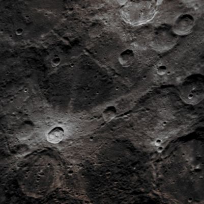 Bright Rayed Crater (Enhanced Natural Colors; credits for the additional process. and color.: Dr Paolo C. Fienga - Lunar Explorer Italia)
The Ejecta of this (relatively, of course) "fresh" approx. 20-Km Impact Crater swept the Surface, leaving beautiful bright Rays. Crater Rays fade with time as smaller impacts mix them into the surrounding Soil while Particles from the Solar Wind change the Surface's Chemistry. Given a little time (perhaps a million years or so), this Unnamed Crater will look like the other similar-sized Craters in the frame.

Date acquired: November, 17th, 2011
Image Mission Elapsed Time (MET): 230018573
Image ID: 1023529
Instrument: Narrow Angle Camera (NAC) of the Mercury Dual Imaging System (MDIS)
Center Latitude: 51,0° South
Center Longitude: 175,1° East
Resolution: 221 meters/pixel
Scale: the Rayed Crater is approximately 20 Km (about 12 miles) in diameter
Solar Incidence Angle: 53,1° (meaning that the Sun is about 36,9° above the Local Horizon)
Emission Angle: 37,8°
Sun-Mercury-MESSENGER (or "Phase") Angle: 78,6°
Parole chiave: Mercury from orbit - Craters - Unnamed Rayed Crater