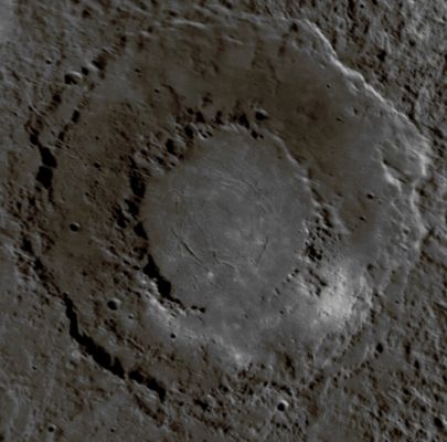 Unnamed Double-Ring Basin (Natural Colors; credits: Lunexit)
This spectacular approx. 290-Km-diameter Double-Ring Basin seen in detail for the first time during MESSENGER's 3rd flyby of Mercury bears a striking resemblance to Raditladi Basin, observed during the 1st flyby. 
This still-unnamed basin is remarkably well preserved and appears to have formed relatively recently, compared with most basins on Mercury. The low numbers of superposed impact craters and marked differences in color across the basin (seen in this enhanced color image released earlier this week) suggest that the smooth area within the innermost ring may be the site of some of the most recent volcanism on Mercury. 

Date Acquired: September 29, 2009
Instrument: Narrow Angle Camera (NAC) of the Mercury Dual Imaging System (MDIS)
Scale: This double-ring basin is approx. 290 Km (about 180 miles) in diameter
Parole chiave: Mercury's Fly-By