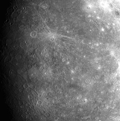 Rayed Crater on Mercury
Just above and to the left of center of this image is a small crater with a pronounced set of bright rays extending across Mercury's surface away from the crater. Bright rays are commonly made in a crater-forming explosion when an asteroid strikes the surface of an airless body like the Moon or Mercury. But rays fade with time as tiny meteoroids and particles from the Solar Wind strike the surface and darken the rays. The prominence of these rays implies that the small crater at the center of the ray pattern formed comparatively recently.
This image is 1 in a planned set of 99. Nine different views of Mercury were snapped in this set to create a mosaic pattern with images in 3 rows and 3 columns. The WAC is equipped with 11 narrow-band color filters, and each of the 9 different views was acquired through all 11 filters. This image was taken in filter 7, which is sensitive to light near the red end of the visible spectrum (750 nm), and shows features as small as about 6 Km (about 4 miles) in size. 

The MESSENGER team is studying this previously unseen side of Mercury in detail to map and identify new geologic features and to construct the Planet’s geological history. 

Mission Elapsed Time (MET) of image: 108827618
Parole chiave: Mercury Fly-By