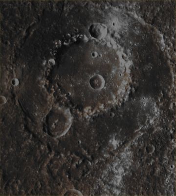 Wang Meng Crater, in detail (Possible Absolute Natural Colors; credits for the additional process. and color.: Dr Paolo C. Fienga/Lunar Explorer Italia/Italian Planetary Foundation)
The large Wang Meng Impact Basin (whose diameter is approx. 165 Km - such as about 102,465 miles) can clearly be see in this Extra Detail Magnification which is a crop taken mosaic made out of three frames obtained by the NASA - MESSENGER Spacecraft on April, 20, 2013. This Absolute Natural Color view of the Impact Basin shows us, among many other extremely interesting things, the strong contrast between the dark Low Reflectance Material (or "LRM", for short) which is located on the Eastern Portion of Wang Meng's Peak Ring and the brighter Western Portion of the Peak Ring itself, as well as the bright white Rays that spread across the lower right side (---> West) of the picture. 
While some of the Hollows existing on and near the Crater's Peak Ring and Outer Rim are, somehow, "associated" (here and there, and always unevenly) with Low Reflectance Material, as evidenced by their bright white halos, the Rays that are visible here (---> such as towards the Western and South/Western sides of the frame) are, in fact, coming from other Impact Craters located in Wang Meng's proximities - including the small, fresh Impact Crater visible towards the upper right corner of the picture, just in betwenn the Peak Ring and the Outer Rim of Wang Meng. 

Date acquired: April, 20th, 2013
Images Mission Elapsed Time (MET): 8743264, 8743256, 8743260
Images ID: 3915336, 3915334, 3915335
Instrument: Wide Angle Camera (WAC) of the Mercury Dual Imaging System (MDIS)
Center Latitude: 6,33° North
Center Longitude: 254,10° East
Solar Incidence Angle: 41,6° (meaning that the Sun, at the time that the pictures were taken, was about 48,4° above the imaged Local Mercurian Horizon)
Emission Angle: 0,2°
Sun-Mercury-Messenger (or "Phase") Angle: 41,7°

This frame (which is a crop taken from an Original NASA - MESSENGER Spacecraft's false colors and Map-Projected image-mosaic published on the NASA - Planetary Photojournal with the ID n. PIA 17239) has been additionally processed, contrast enhanced, magnified to aid the visibility of the details, Gamma corrected and then re-colorized in Absolute Natural Colors (such as the colors that a human eye would actually perceive if someone were onboard the NASA - MESSENGER Spacecraft and then looked down, towards the Mercurian Impact Crater "Wang Meng"), by using an original technique created - and, in time, dramatically improved - by the Lunar Explorer Italia Team. Different colors, as well as different shades of the same color, mean, among other things, the existence of different Elements (Minerals) present on the Surface of Mercury, each having a different Albedo (---> Reflectivity) and Chemical Composition.
Parole chiave: Mercury from orbit - Craters - Wang Meng Crater