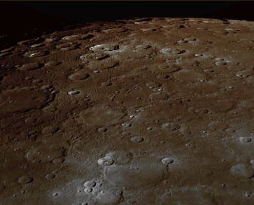 A View to the South�from the Other Side of Mercury (Extremely Enhanced Natural Colors; credits for the additional process. and color.: Dr Paolo C. Fienga/Lunar Explorer Italia/Italian Planetary Foundation)
MESSENGER’s 2nd Mercury flyby passed over the opposite side of the Planet from that seen during the Mission’s 1st Mercury encounter. Thus, if one could follow this view obtained by the NAC during the 2nd flyby toward the South, beyond Mercury’s South Pole, it would lead to the Surface seen in an image from MESSENGER’s 1st Mercury flyby (see PIA10187). 

Visible in the recently obtained image shown here are many features also seen by Mariner 10: Shevchenko crater named for the 19th century Ukrainian poet, Khansa for the Arabic poet of the 7th century, Rabelais for the Renaissance French writer, Holberg for the Norwegian-Danish writer of the 18th century, Spitteler for the Swiss epic poet who won the Nobel Prize for Literature in 1919, Rameau for the Baroque-era French composer, Puccini for the Italian composer of the late 1800s and early 1900s, and Horace for the ancient Roman poet. Discovery Rupes cuts through Rameau and is named for the ship of English explorer Captain James Cook. 

Date Acquired: October 6, 2008
Image Mission Elapsed Time (MET): 131773823
Instrument: Narrow Angle Camera (NAC) of the Mercury Dual Imaging System (MDIS)
Resolution: 510 meters/pixel (0,32 miles/pixel) at the top of the image
Scale: Shevchenko crater is approx. 137 Km (about 85 miles) in diameter
Spacecraft Altitude: approx. 20.000 Km (about 12.400 miles)
Parole chiave: Mercury