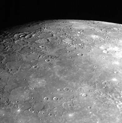 The North Pole of Mercury
As MESSENGER sped by Mercury on January 14, 2008, the NAC of the Mercury Dual Imaging System (MDIS) captured this shot looking toward Mercury's North Pole. 
The surface shown in this image is from the side of Mercury not previously seen by spacecraft. 
The top right of this image shows the limb of the Planet, which transitions into the Terminator on the top left of the image. 
Near the Terminator, the Sun illuminates surface features at a low angle, casting long shadows and causing height differences of the surface to appear more prominent in this Region.
It is interesting to compare MESSENGER's view to the North with the image looking toward the South Pole, released on January 21. Comparing these two images, it can be seen that the terrain near the South Pole is more heavily cratered while some of the Regions near the North Pole show less cratered, smooth plains material, consistent with the general observations of the poles as made by Mariner 10.

This image was acquired about 94' after MESSENGER's closest approach to Mercury, when the spacecraft was at a distance of about 32.000 Km (such as approx. 20.000 miles). 

Mission Elapsed Time (MET) of image: 108830513
Parole chiave: Mercury Fly-By