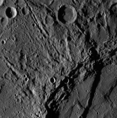 Deep Scarp on Mercury (HR)
NASA’s MESSENGER Spacecraft captured this image on January 14, 2008, during its closest approach to Mercury. The image reveals a variety of intriguing surface features, including craters as small as 300 yards across. 
The image also shows landscapes near Mercury’s Equator on the side of the Planet never before imaged by spacecraft. These highly detailed close-ups enable planetary geologists to study the processes that have shaped Mercury’s surface over the past 4 Billion Years. One of the highest and longest scarps cliffs yet seen on Mercury curves from the top center down across the right side of this image. Great forces in Mercury’s crust have thrust the terrain occupying the left two-thirds of the picture up and over the terrain to the right. An impact crater has subsequently destroyed a small part of the scarp near the top of the image. 
This image was taken from a distance of 3600 miles from surface of the Planet and shows a region approximately 100 miles across. 
Parole chiave: Mercury Fly-By