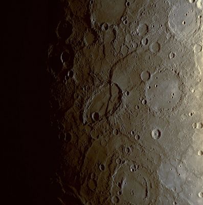 Sveinsd�ttir Crater and Beagle Rupes (natural colors; credits: Lunexit)
Named for Júlíana Sveinsdóttir, an Icelandic painter and textile artist, Sveinsdóttir Crater superimposed by Beagle Rupes is a distinctive feature on Mercury's landscape. Unusually elliptical in shape, the Crater was produced by the impact of an object that hit Mercury’s Surface obliquely. More than 600 Km (about 370 miles) long and one of the largest fault scarps on the Planet, Beagle Rupes marks the surface expression of a large thrust fault believed to have formed as Mercury cooled and the entire planet shrank. Beagle Rupes crosscuts Sveinsdóttir Crater and has uplifted the easternmost portion (right side portion) of the crater floor by almost a kilometer, indicating that most of the fault activity at Beagle Rupes occurred after the impact that created Sveinsdóttir. Crosscutting relationships such as this are used to understand the sequence in time of the different processes that have affected Mercury’s evolution. 

Date Acquired: January 14, 2008
Image Mission Elapsed Time (MET):108830230
Instrument: Narrow Angle Camera (NAC) of the Mercury Dual Imaging System (MDIS)
Resolution: 0,77 Kilometers/pixel (0,48 miles/pixel)
Scale: This image is about 780 Km (approx. 490 miles) across; Sveinsdóttir crater is about 120 by 220 Km (appprox. 75 by 140 miles)
Spacecraft Altitude: about 30.300 Km (approx. 18.800 miles) 


Parole chiave: Mercury