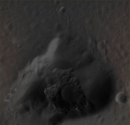 Volcanic Vent on the Edge of Caloris Basin (Absokute Natural Colors; credits for the additional process. and color.: Dr Paolo C. Fienga/Lunar Explorer Italia/Italian Planetary Foundation)
This kidney-shaped Surface Depression (which is approximately 23 Km - such as 14,283 miles - across its longest dimension) lies along the Inner Margin of the giant Caloris Basin and it was first imaged during the NASA - MESSENGER Spacecraft's first Fly-By of the innermost Planet in the Solar System, about 2 years ago. The Rimless, non-circular Surface Depression is, in fact, the Vent of a small, explosive Volcano, and it is similar to many other Volcanic Vents that have been discovered on Mercury. The small number of superposed Impact Craters indicates that this Feature is, just in a manner of speaking, relatively "young" as to the surrounding Terrain. Notice, also, the considerable number of bright Hollows that seem to characterize a large portion of the Inner Rim as well as the East-facing Slopes of the small Impact Crater located right outside the Eastern Margin of the Vent, at about 4 o'clock of the Main Feature.

Note: for another view of this Volcanic Vent and its extremely interesting surroundings (seen on a larger scale), please refer to the APOD of December, 22nd, 2012.

Date acquired: June 7th, 2011
Image Mission Elapsed Time (MET): 215894570 
Image ID: 347724
Instrument: Narrow Angle Camera (NAC) of the Mercury Dual Imaging System (MDIS)
Center Latitude: 22,5° North
Center Longitude: 146,1° East
Resolution: 28 meters/pixel
Solar Incidence Angle: 39,6° (meaning that the Sun, at the time that the picture was taken, was about 50,4° above the imaged Local Mercurian Horizon)
Emission Angle: 45,5°
Sun-Mercury-Messenger (or "Phase") Angle: 78,3°

This picture (which has been cropped from an Original NASA - MESSENGER Spacecraft b/w frame published on the NASA - Planetary Photojournal with the ID n. PIA 15245) has been additionally processed and then colorized in Absolute Natural Colors (such as the colors that a human eye would actually perceive if someone were onboard the NASA - MESSENGER Spacecraft and then looked down, towards the Surface of Mercury), by using an original technique created - and, in time, dramatically improved - by the Lunar Explorer Italia Team. Different colors, as well as different shades of the same color, mean, among other things, the existence of different Elements (Minerals) present on the Surface of Mercury, each having a different Albedo (---> Reflectivity) and Chemical Composition.
Parole chiave: Mercury from orbit - Volcanic Features - Vent