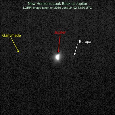 On the Way to Pluto: Jupiter, Europa and Ganymede
Caption NASA:"New Horizons had an exciting Fly-By encounter with Jupiter in early 2007, and the Spacecraft has been rapidly moving away from the Giant Planet ever since. 
The New Horizons team looked back at Jupiter during Annual Checkout (ACO) to test the Long Range Reconnaissance Imager (LORRI)'s ability to image targets close, in angle, to the Sun. 

This image was taken on June 24, 2010, when New Horizons was 16,3 Astronomical Units (about 1,5 Billion Miles) from Jupiter, at a Spacecraft-Sun-Planet angle of only 17°. Looking like Earth's moon at a quarter phase, Jupiter is clearly resolved, with an apparent diameter of nearly 12 LORRI pixels. LORRI also picks up the moons Ganymede and Europa, even though the exposure time was only 9 milliseconds and these Galilean satellites are extremely faint in comparison to Jupiter".
Parole chiave: From Space Pictures - New Horizons Probe