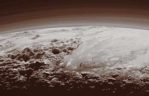 15 Minutes after Pluto - Closer View (Absolute Natural Colors; credits for the additional process. and color.: Dr Paolo C. Fienga - Lunexit Team)
Just 15 minutes after its Closest Approach to Pluto - which occurred on July, 14, 2015 -, the NASA - New Horizons Spacecraft looked back toward the Sun and captured this simply beautiful Near-Sunset View of the rugged, Icy Mountains and flat Ice Plains extending all over around and to Pluto's Horizon and Terminator Line. 

The smooth expanse of the Icy Plains which have (so far) been informally named Sputnik Planum (watch to the right - Dx - of the picture) is flanked to the West (left - Sx) by rugged Mountains that reach up an altitude of approx. 11.000 feet (such as, roughly, 3352,8 meters), including the (even in this case, so far) informally named Norgay Montes (visible in the foreground) and the Hillary Montes, visible on the Skyline (---> Outer Edge/Horizon of Pluto). To the right (Dx), such as to the East of Sputnik Planum, some rougher (---> highly irregular) Terrain is cut by - what they appear to be - Glaciers. Furthermore, the backlighting, highlights several Layers of Haze in Pluto's tenuous - but quite uniform and highly distended - Atmosphere. 

This image was taken from a distance of about 11.000 miles (such as approx. 17.702,74 Km) from the Surface of Pluto; finally, the whole scene is roughly 230 miles (about 370,1482 Km) wide. 

The image (which is an Original NASA - New Horizons Spacecraft's b/w and NON Map-Projected frame published on the NASA - Planetary Photojournal with the ID n. 19947) has been additionally processed, magnified to aid the visibility of the details, contrast enhanced and sharpened, Gamma corrected and then colorized (according to an educated guess carried out by Dr Paolo C. Fienga-LXTT-IPF) in Absolute Natural Colors (such as the colors that a normal human eye would actually perceive if someone were onboard the NASA - New Horizons Spacecraft and then looked outside, towards the Dwarf-Planet Pluto), by using an original technique created - and, in time, dramatically improved - by the Lunar Explorer Italia Team.
Parole chiave: Pluto