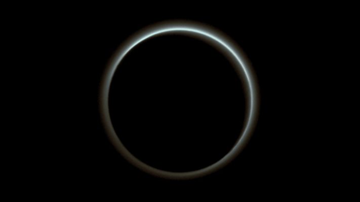 Farewell to Pluto - Part I (Absolute Natural Colors; credits for the additional process. and color.: Dr Paolo C. Fienga/Lunar Explorer Italia/Italian Planetary Foundation)
Even though it is (just slightly) unevenly backlit by the Sun, Pluto’s Atmosphere shows its "foggy" silhouette like a Luminous Halo in this beautiful image taken by the NASA - New Horizons Spacecraft around midnight (EDT) on July, 15, 2015. 

This global portrait of the Plutonian Atmosphere was captured when the NASA - New Horizons Spacecraft was already about 1,25 Million Miles (such as approx. 2.011.675 Million KiloMeters) away from Pluto, and it shows us Atmospherical Structures (quite similar, in our opinion, as IPF, to the ones visible all around the Saturnian moon Titan) as small as roughly 12 miles (approx. 19,312 Km) across. The image, which has been received on Earth on July, 23, 2015, is displayed with the North Pole of Pluto at the top of the frame.

The image (which is an Original NASA - New Horizons Spacecraft's b/w and NON Map-Projected frame published on the NASA - Mew Horizons Page of July, 24, 2015 and with the ID n. nh_01_stern_05_pluto_hazenew) has been additionally processed, magnified to aid the visibility of the details, contrast enhanced and sharpened, Gamma corrected and then colorized (according to an educated guess carried out by Dr Paolo C. Fienga-LXTT-IPF) in Absolute Natural Colors (such as the colors that a normal human eye would actually perceive if someone were onboard the NASA - New Horizons Spacecraft and then looked ahead, towards the Dwarf-Planet Pluto), by using an original technique created - and, in time, dramatically improved - by the Lunar Explorer Italia Team.
Parole chiave: Pluto