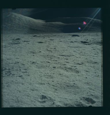 AS 17-147-22506 - Lunar Panorama
EVA-1 at the LM. 4 o'clock pan. Shadowed Sculptured Hills and crater. Large boulders.
Parole chiave: Lunar Panorama - Sculptured Hills