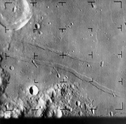 The Moon from Ranger-8: Mare Tranquillitatis (5)
Caption NASA:"Ranger 8 image of the Mare Tranquillitatis (Sea of Tranquillity) area of the Moon taken from 511 Km about 4 minutes before surface impact. The 30 Km diameter Sabine crater is at upper left. Note the two linear features at the center of the frame and rugged region at the bottom. 
The frame is about 95 Km across and North is up. 
The Apollo 11 Landing Site is about 30 Km to the right of this area (Ranger 8, B045)".
Parole chiave: The Moon