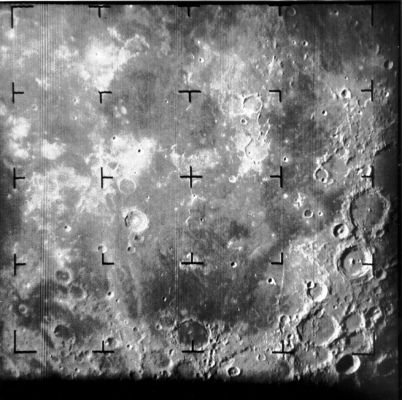 The Moon from Ranger-9: Alphonsus Crater (1)
Caption NASA:"The first Ranger 9 image of the Moon, taken with the A camera from a distance of 2378 Km. The image is centered on the Mare Nubium Region of the Moon, which extends to the bottom of the image. At upper left is South-Eastern Oceanus Procellarum. The two craters with the central peaks at right are Alphonsus, diameter 108 Km and below it Arzachel, diameter 96 Km. The crater near the center at about 8:00 is 60 Km Bullialdus. The frame is approximately 1050 Km across and North is at 12:30. The final impact point of Ranger 9 is in the Alphonsus Crater, midway between the central peak and rim at about 1:30 (Ranger 9, A001)".
Parole chiave: The Moon