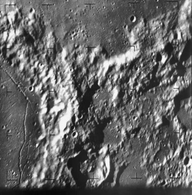 The Moon from Ranger-9: Alphonsus Crater (5)
Caption NASA:"Ranger 9 camera B image of the North-East rim of Alphonsus Crater at left and Southern rim of Ptolemaeus Crater at the top. The image was taken from 700 Km distance about 4,5 minutes before impact in Alphonsus Crater. The intersecting crater rims exhibit a chaotic, mountainous terrain, in sharp contrast to the flat crater floors. The frame is approximately 120 Km across and North is at 12:30. The image is centered at 12° South Lat. and 1° West Long. (Ranger 9, B035)".
Parole chiave: The Moon